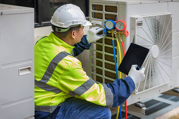 Professional Hvac technician working in Heisson, WA